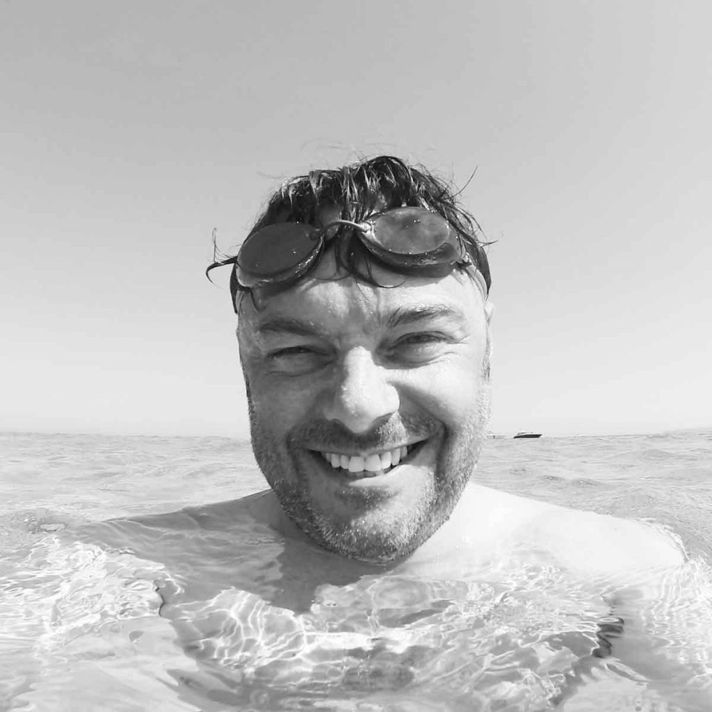 Adrian Cartwright swimming in the sea